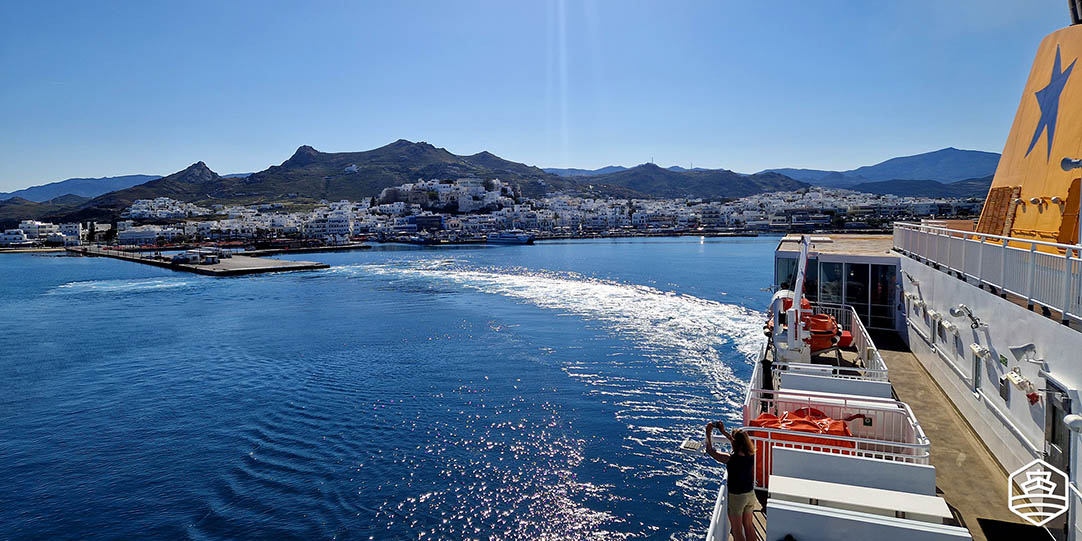 The vessel Blue Star Delos leaving the port of Naxos