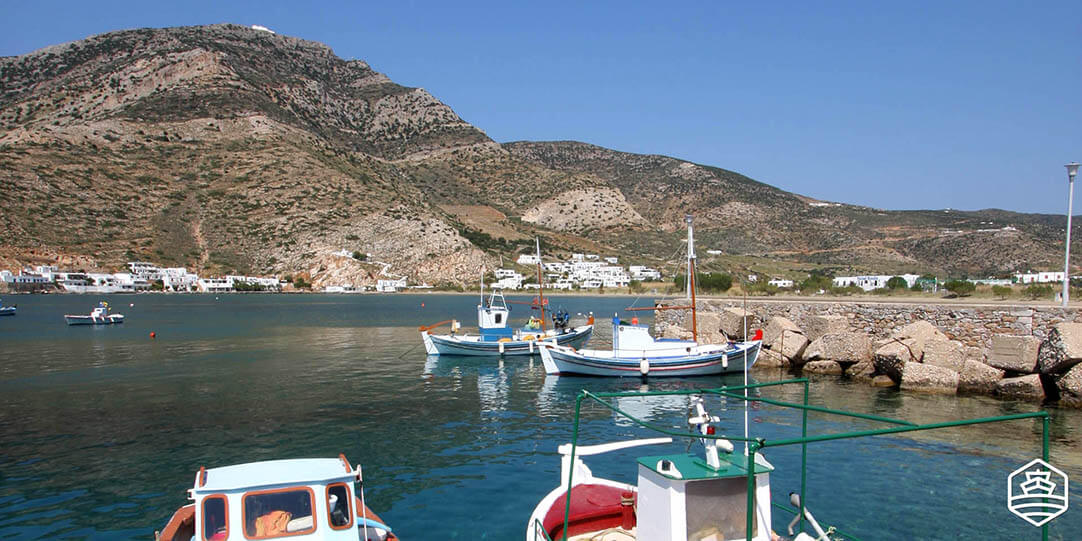Fishing boats mooring in the bay of Kamares village