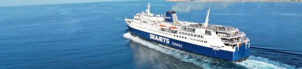 The conventional ferry Superstar of Seajets in the bay of Parikia in Paros